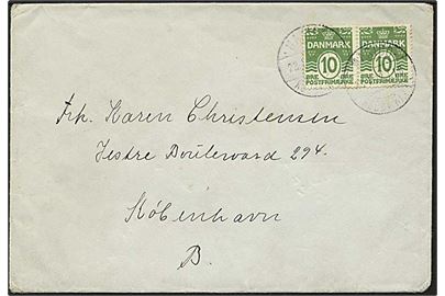 10 øre Bølgelinie i parstykke på brev annulleret med bureaustempel Maribo - Rødby Havn T.18 d. 23.1.1922 til København.