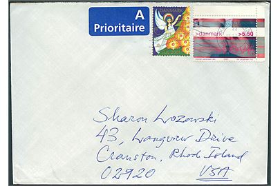 5,50 kr. Ungdomskultur og Julemærke 2001 på brev fra Københavns Postcenter d. 19.12.2001 til Cranston, USA.