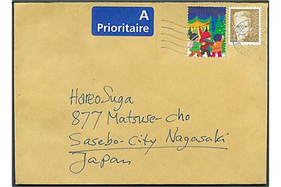 6 kr. Margrethe og Julemærke 2002 på brev fra Københavns Postcenter d. 27.12.2002 til Sasebo city, Nakasaki, Japan.