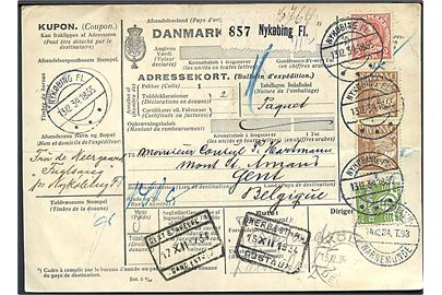 5 øre Bølgelinie, 25 øre Karavel (par) og 2 kr. Chr. X på internationalt adressekort for pakke fra Nykøbing F. d. 13.12.1934 via Kjøbenhavn - Warnemünde T.93 og Köln til Gent, Belgien.