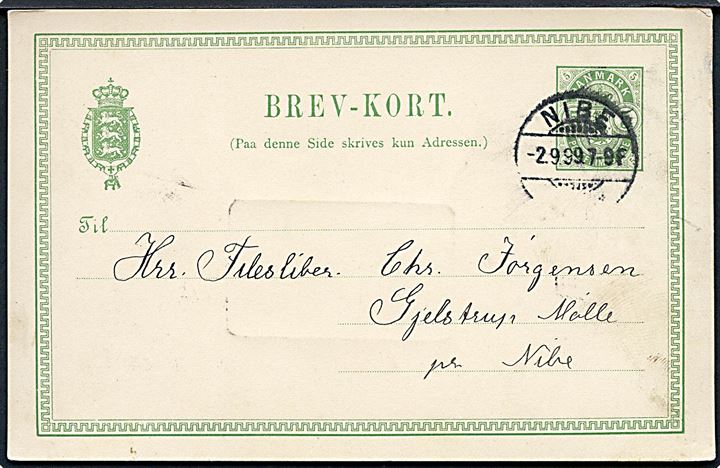 5 øre Våben helsagsbrevkort benyttet som adviskort fra Nibe d. 2.9.1899 til Gjelstrup Mølle pr. Nibe. På bagsiden privat jernbanestempel A.N.S.J. Nibe d. 1.9.1899 (A.N.S.J. = Aars-Nibe-Svendstrup Jernbane).