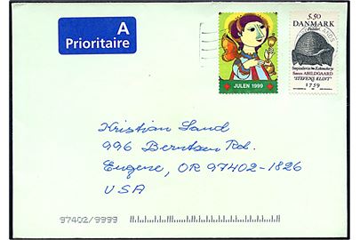 5,50 kr. Forsiller og Røde Kors julemærke 1999 på brev fra Sindal stemplet Nordjyllands Postcenter 1999 til Eugene, USA.