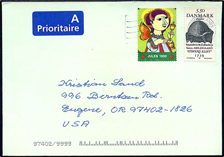 5,50 kr. Forsiller og Røde Kors julemærke 1999 på brev fra Sindal stemplet Nordjyllands Postcenter 1999 til Eugene, USA.