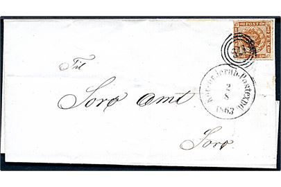 4 sk. stukken kant på brev annulleret med nr.stempel 179 og sidestemplet antiqua Korsör Jernb. Postexped: d. 2.8.1863 til Sorø.
