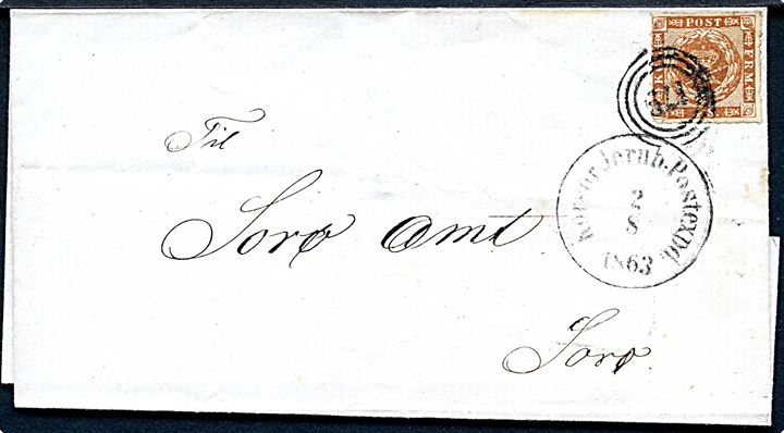4 sk. stukken kant på brev annulleret med nr.stempel 179 og sidestemplet antiqua Korsör Jernb. Postexped: d. 2.8.1863 til Sorø.