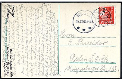 15 øre Karavel på brevkort annulleret med stjernestempel VANG og sidestemplet brotype IIIb Hasle d. 12.7.1928 til Berlin, Tyskland.