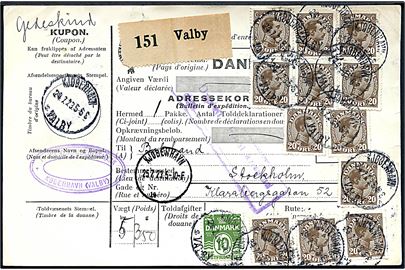 10 øre Bølgelinie og 20 øre Chr. X (12) på 250 øre frankeret internationalt adressekot for pakke fra Kjøbenhavn Valby d. 24.7.1923 til Stockholm, Sverige.