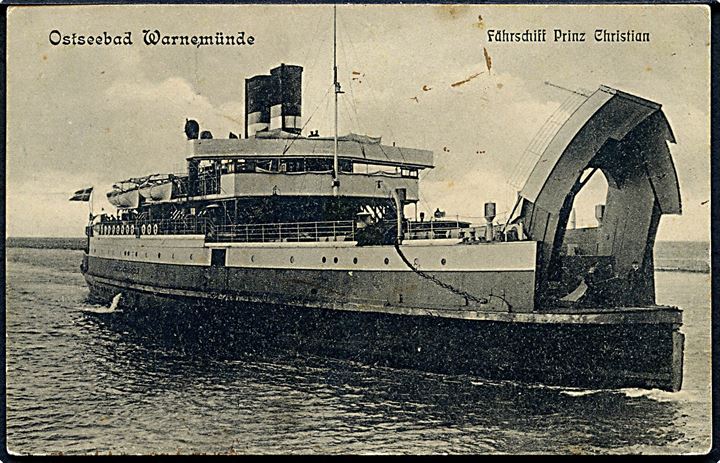 5 pfg. Germania på brevkort (Jernbanefærgen Prins Christian i Warnemünde) annulleret med bureaustempel Kjøbenhavn - Warnemünde T.92 d. 10.10.1909 og sidestemplet Fra Tyskland til Berlin, Tyskland.