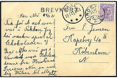 15 øre Chr. X på brevkort (Oremandsgaard) annulleret med stjernestempel VINDBYHOLT og sidestemplet Faxe d. 29.7.1921 til København.