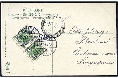5 øre Fr. VIII i parstykke på brevkort fra Hellebæk d. 21.8.1907 til Singapore. Transit stempel Penang to Singapore d. 13.9.1907.