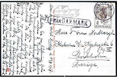 10 øre Regentjubilæum på brevkort (Hammershus) dateret Sandvig annulleret med svensk stempel i Simrishamn d. 24.7.1937 og sidestemplet Från Danmark til Stockholm, Sverige. God skibspost mellem Bornholm og Sverige.