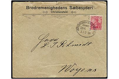 10 pfg. Germania på fortrykt kuvert fra Brødremenighedens Sæbesyderi i Christiansfeld annulleret med bureaustempel Hadersleben - Christiansfeld Bahnpost Zug 5 d. 30.10.1900 til Woyens.
