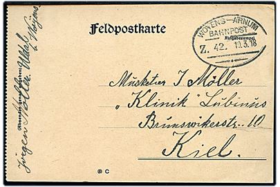 Urankeret feltpostkort dateret Uldal med bureaustempel Woyens - Arnum Bahnpost Zug 42 d. 10.3.1918 til sønderjysk soldat i Kiel.