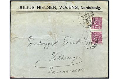 15 pfg. Fælles udg. (2) på fortrykt kuvert fra Vojens annulleret med bureaustempel Hamburg - Vamdrup Bahnpost Zug 753 d. 29.1.1920 til Kolding, Danmark. Lodret fold.