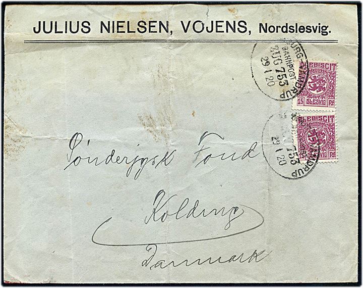 15 pfg. Fælles udg. (2) på fortrykt kuvert fra Vojens annulleret med bureaustempel Hamburg - Vamdrup Bahnpost Zug 753 d. 29.1.1920 til Kolding, Danmark. Lodret fold.
