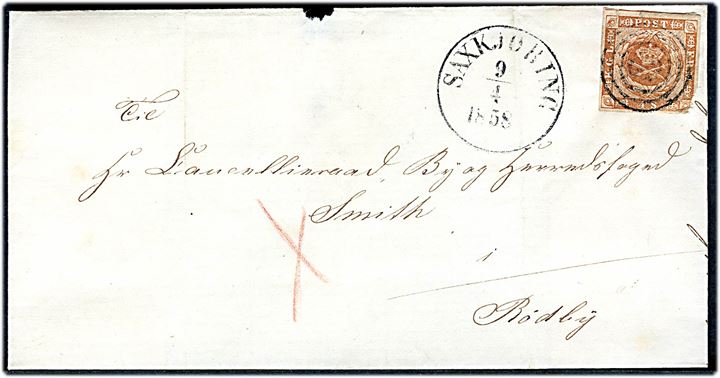 4 sk. 1854 (hj. skade) på brev annulleret med nr.stempel 62 og sidestemplet antiqua Saxkjøbing d. 9.4.1858 til Kancelliraad, By og Herredsfoged Smidth i Rødby. Rødt kryds af ukendt betydning.