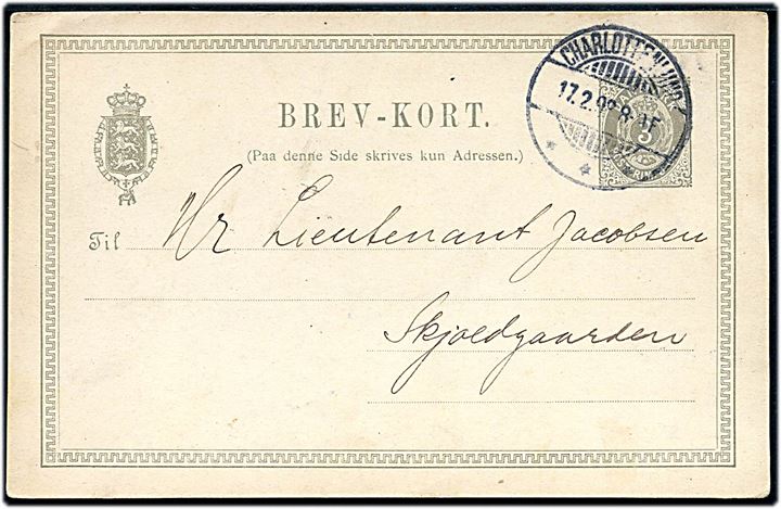 3 øre helsagsbrevkort anvendt som lokalt adviskort for banepakke fra Charlottenlund d. 17.2.1898 til Skjoldgaarden. På bagsiden ovalt jernbanestempel: Charlottenlund * D.S.B. * d. 17.2.1898.