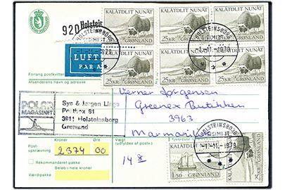 1,50 kr. Postbefordring og 25 kr. Moskusokse (7) på adressekort for indenrigs luftpostpakke fra Holsteinsborg d. 1.11.1979 til Marmorilik.