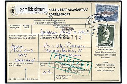 7 kr. Tupilak og 25 kr. Torsk på adressekort for pakke fra Holsteinsborg d. 13.1.1986 til Virum.