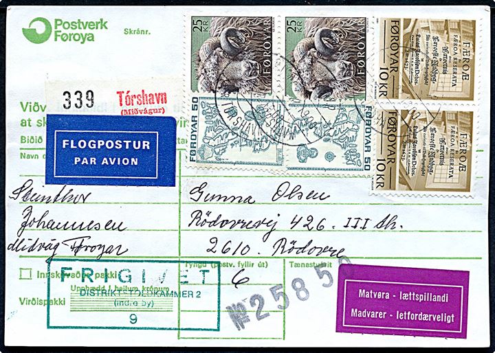 50 øre Landkort (2), 10 kr. Skrifter (par) og 25 kr. Vædder (par) på 71 kr. frankeret adressekort for luftpostpakke fra Midgavur pr. Tórshavn d. 2.11.1982 til Rødovre, Danmark. Påsat lilla etiket Madvarer.