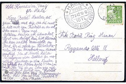 15 øre Karavel på brevkort annulleret med udslebet stjernestempel VANG og sidestemplet med turiststempel Hasle d. 22.6.1942 til Hellerup.