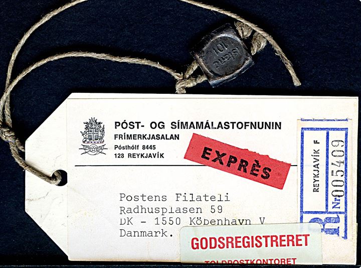 Manila-mærke med plombe for postsag sendt som anbefalet ekspres fra Reykjavik til Postens Filateli i København.