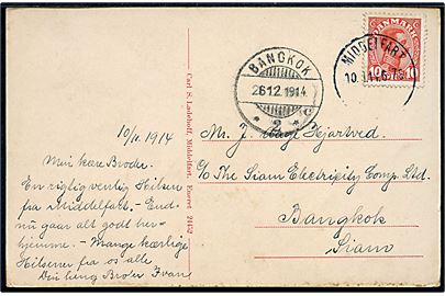 10 øre Chr. X på brevkort fra Middelfart d. 10.11.1914 til  Bangkok, Siam. Ank.stemplet d. 26.12.1914.