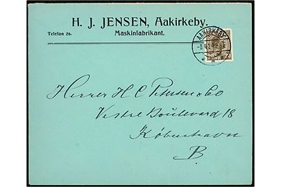 20 øre Chr. X på firmakuvert annulleret med brotype IIa Aakirkeby d. 8.4.1924 til København.