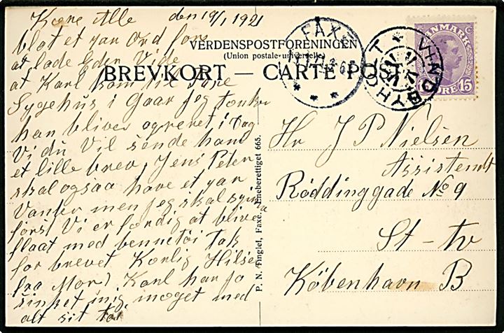 15 øre Chr. X på brevkort (Roholte, kirke og skole) annulleret med stjernestempel VINDBYHOLT og sidestemplet Faxe d. 19.1.1921 til København.
