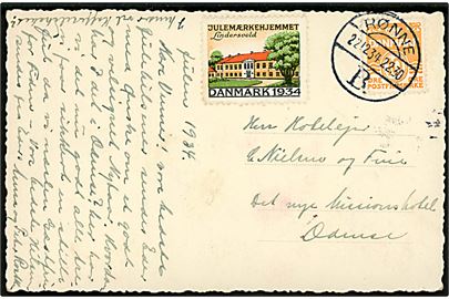 10 øre Bølgelinie og Julemærke 1934 på brevkort annulleret Rønne B. d. 22.12.1934 til Odense.