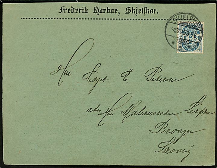 20 øre Tofarvet - med variant afskåret SV-hjørne - på brev fra Skjelskør d. 4.12.1899 til Broager, Slesvig.