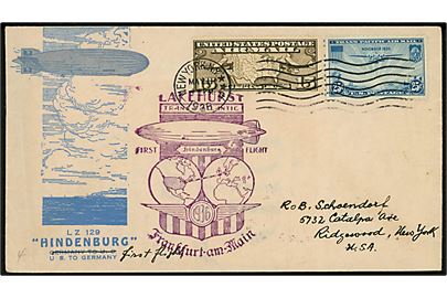 15 c. Luftpost og 25 c. Trans-Pacific Luftpost på illustreret kuvert fra New York d. 11.5.1936 via Frankfurt d. 14.5.1936 til Ridgewood, USA. Violet Zeppelin stempel. På bagsiden maskinstempel Mit Luftschiff Hindenburg befördert / Frankfurt (Main) d. 14.5.1936.