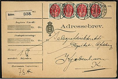 8 øre Tofarvet omv. rm. i vandret 4-stribe på adressebrev for pakke fra Statstelegraphen / Station Hobro annulleret Hobro d. 6.8.1900 til Kjøbenhavn.