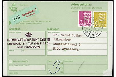 7 kr. og 10 kr. Rigsvåben med perfin H (= Hjemmeværnet) på adressekort for pakke fra Hjemmeværnsdistrikt Sydfyn i Svendborg d. 3.7.1984 til Svendborg.
