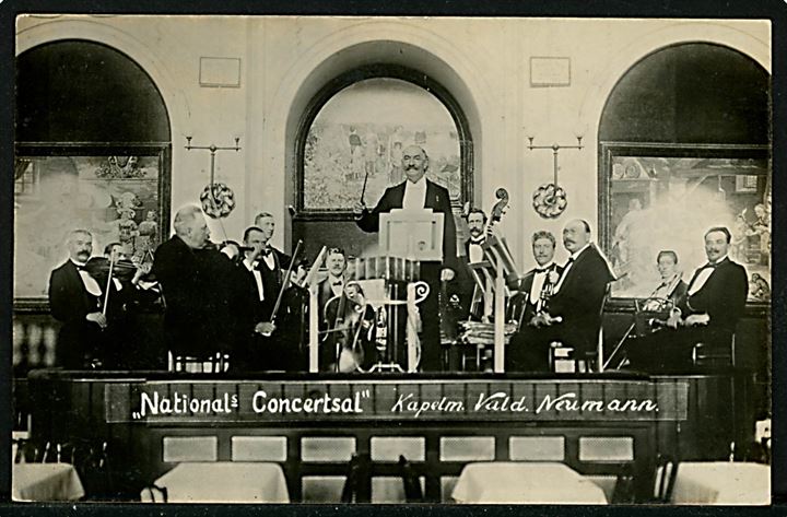 Vesterbros Passage “Nationals Concertsal” med kapelmester Vald. Neumann. Fotokort u/no. Kvalitet 8