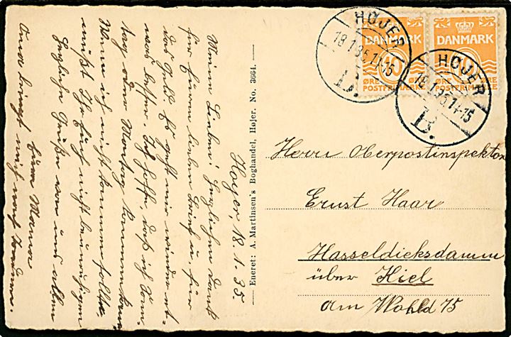 10 øre Bølgelinie i parstykke på brevkort annulleret med brotype Vc Højer B. d. 18.1.1935 til Hasseldieksdamm über Kiel, Tyskland. Anvendt ca. 2 måneder senere end registreret af Vagn Jensen.