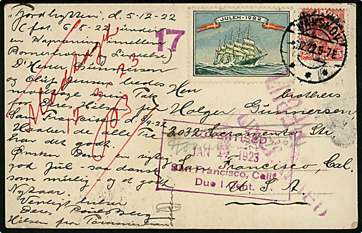 25 øre Chr. X og Julemærke 1922 på brevkort stemplet Nakskov d. 6.12.1922 til San Francisco, USA. Retur med stempler: “Unclaimed” og “Advertised 17.1.1923 San Francisco, Calif. Due 1 Cent.”.
