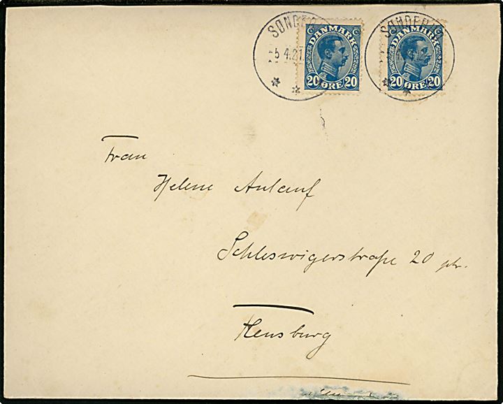 20 øre Chr. X (2) på brev annulleret med brotype IIIb Sønderho d. 5.4.1921 til Flensburg, Tyskland. Kuvert med skade i underkanten. 