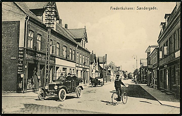 Frederikshavn. Søndergade med J.M.Rugh´s Blikkenslager og Gasvarmemester med gammel Automobil. Herluf W. Jensen u/no. 