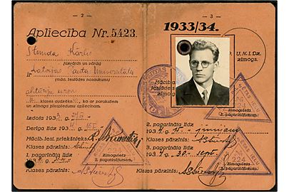 Lettisk Aplieciba 1933/34 med fotografi og flere stempler.