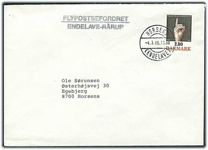 2,80 kr. Døves Landsforbund på is-luftpostbrev stemplet Horsens (Endelave) d. 4.3.1986 til Horsens. Liniestempel: Flypostbefordret Endelave - Rårup.