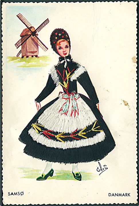 Elsi Gumier: Kvinde fra Samsø. Mølle i baggrunden. Kjole lavet af snor/tråd. Colorame u/no. (Afrevet mærke). 