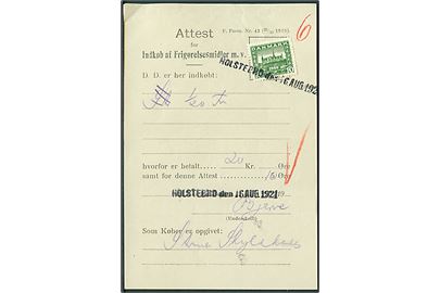10 øre Genforening annulleret med liniestempel Holstebro d. 16.8.1921 på Attest for Indkøb af Frigørelsesmidler m.v.  F. Form. Nr. 43 (28/10 1919). Fortrykt gebyr ændret fra 5 til 10 øre.