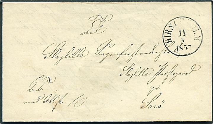1857. Ufrankeret tjenestebrev mærket K.T. med Attest 10 med antiqua Hirschholm d. 11.5.1857 til Slaglille pr. Sorø.
