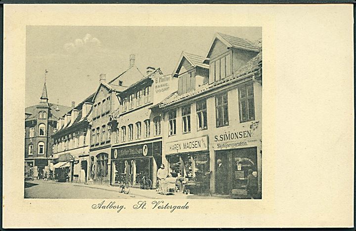 St. Vestergade med butikker i Aalborg. Stenders no. 504. 