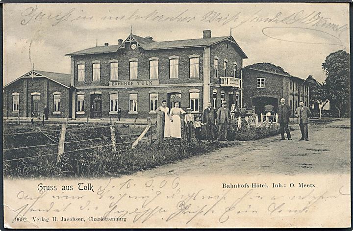 Tyskland, Schleswig. Tolk “Gruss aus” med banegaard og hotel. H. Jacobsen no. 9692. Hj. knæk. Kvalitet 7