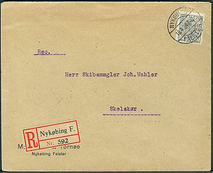 50 øre Chr. X single på anbefalet brev stemplet Nykøbing Falster d. 15.4.1924 til Skelskør.
