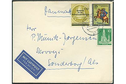 10 pfg. Bygning, 20+10 Hochwasser hilfe og 25+10 pfg. Tag der Briefmarke på luftpostbrev fra Berlin d. 23.12.1956 til Sønderborg, Danmark.