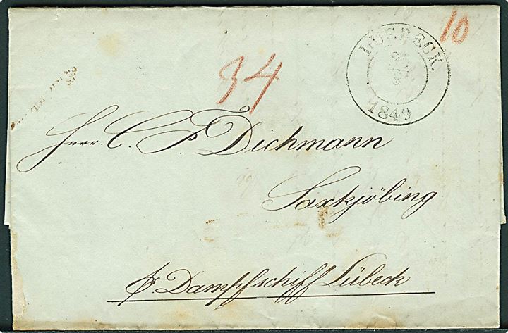 1849. Portobrev stemplet Luebeck d. 24.9.1849 til Saxkjøbing, Danmark. Påskrevet: pr. Dampschiff Lübeck. Porto 32 sk. + 2 sk. bærepenge = 34 skilling.