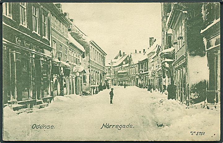 Nørregade med butikker i Odense. Med sne. H. H. O. no. 5751. 